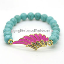 Turquoise 8MM Round Beads Stretch Gemstone Bracelet with Diamante alloy Wing Piece